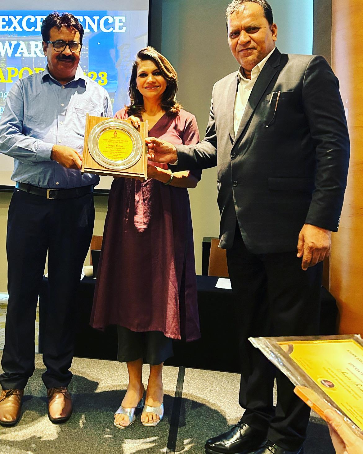 Dr. Deepti Verma receiving the Asian Excellence Award in Singapore, 2023